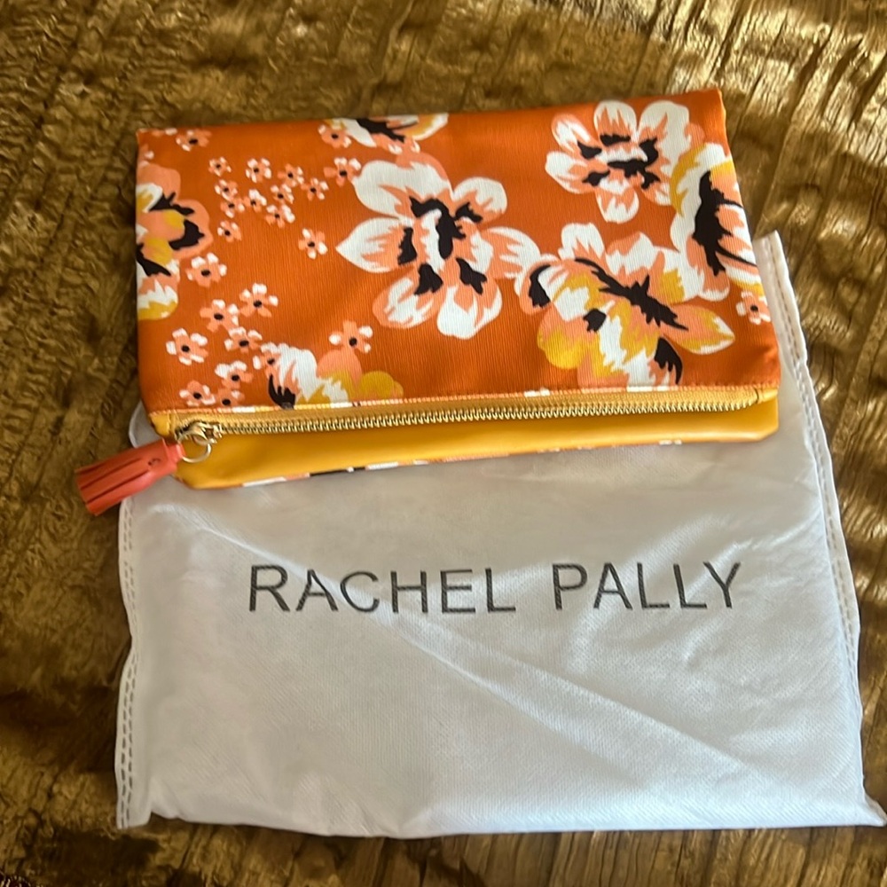 Rachel Paly reversible white and floral clutch.